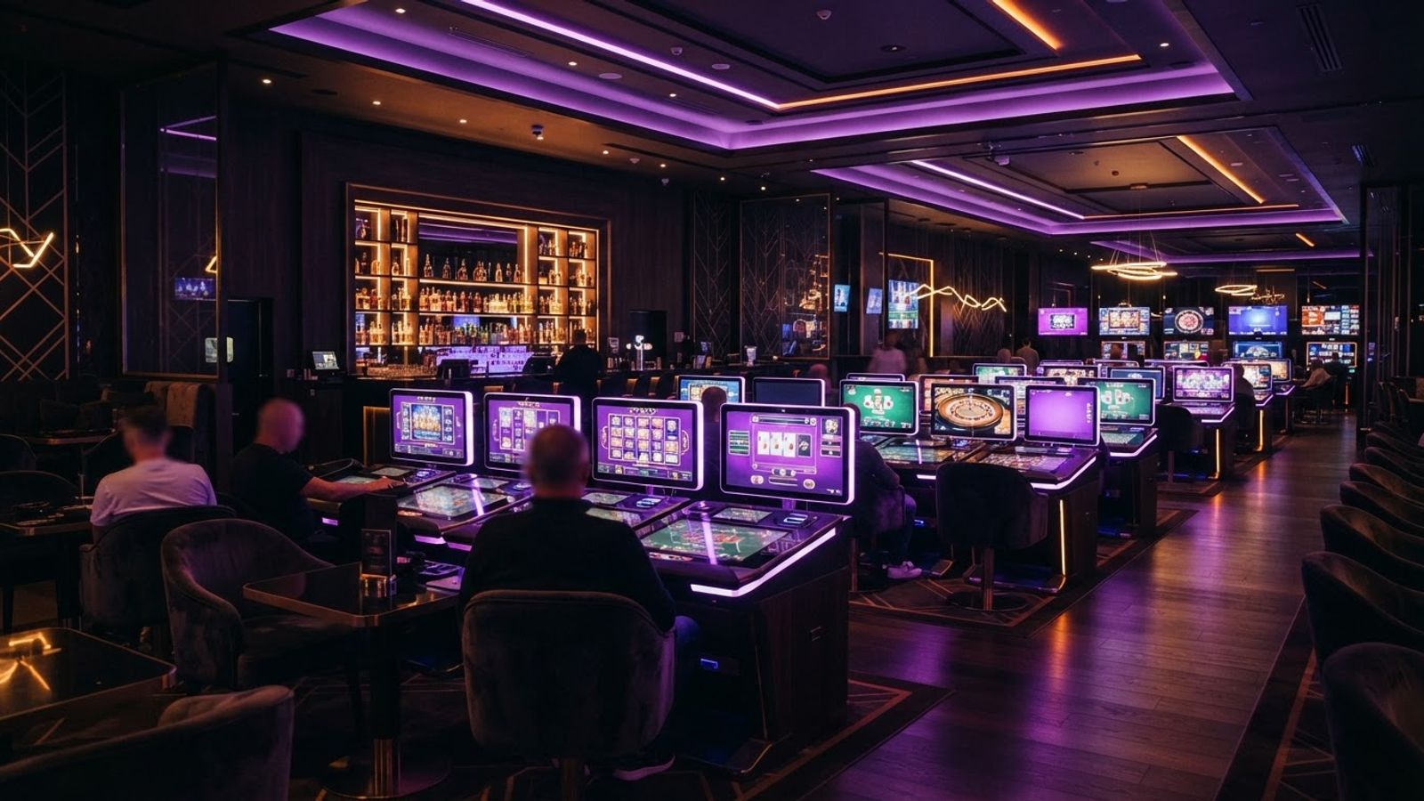 Vue large d'un casino en ligne avec écrans de jeu